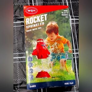 Rocket sprinkler lawn toy nib